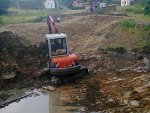 Ausbaggern des groen Teiches