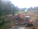 Ausbaggern des groen Teiches